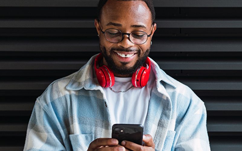 man looking at his phone